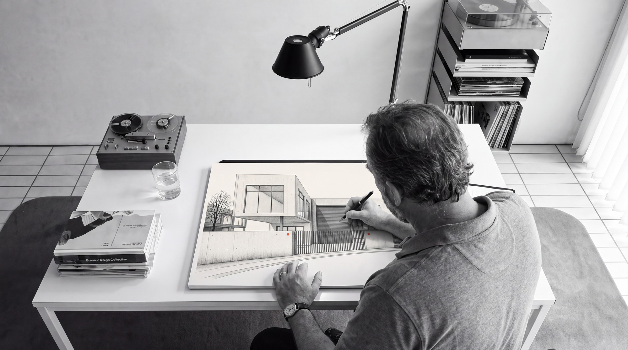 At the drawing desk
